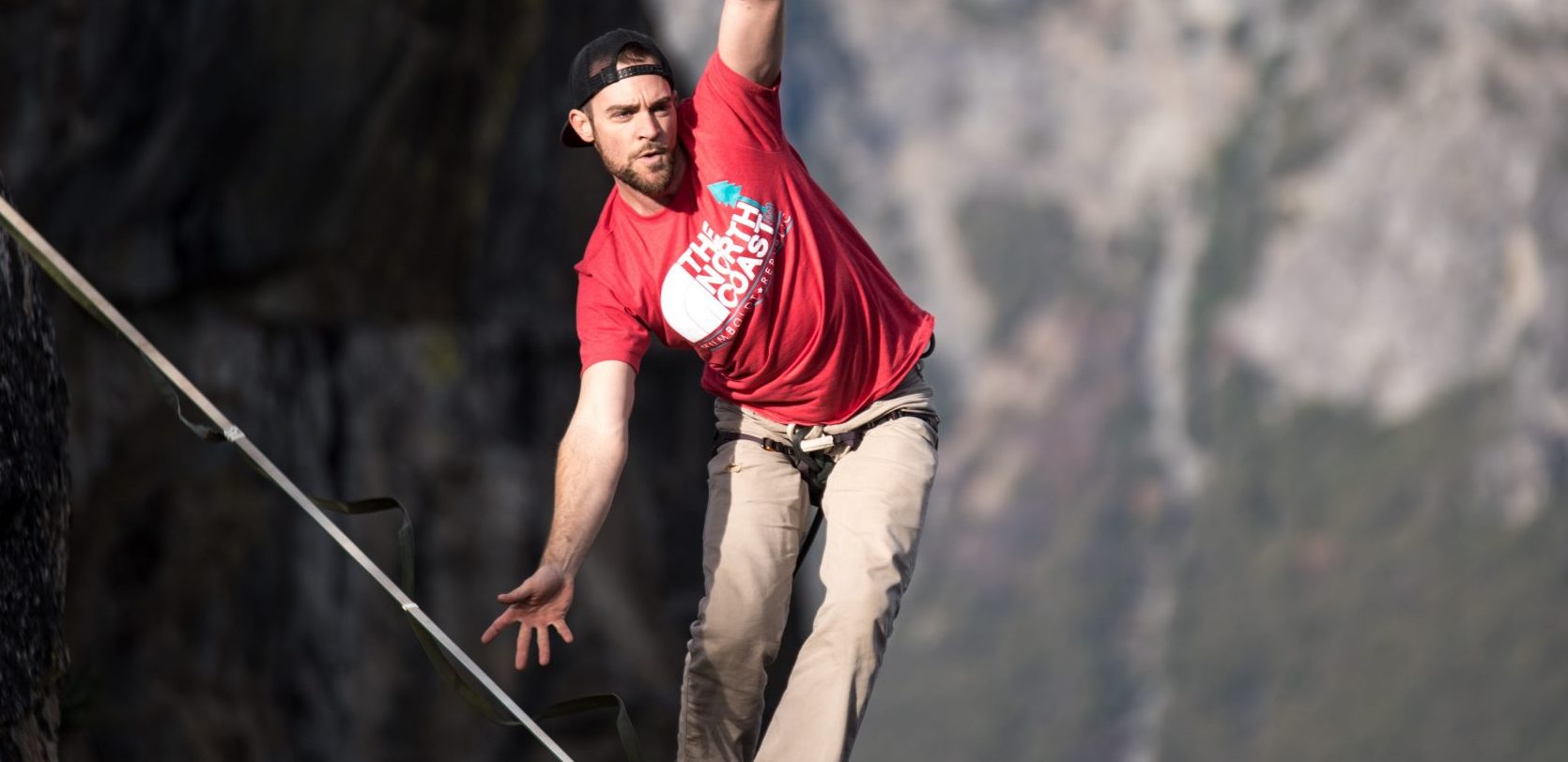 man waking on rope
